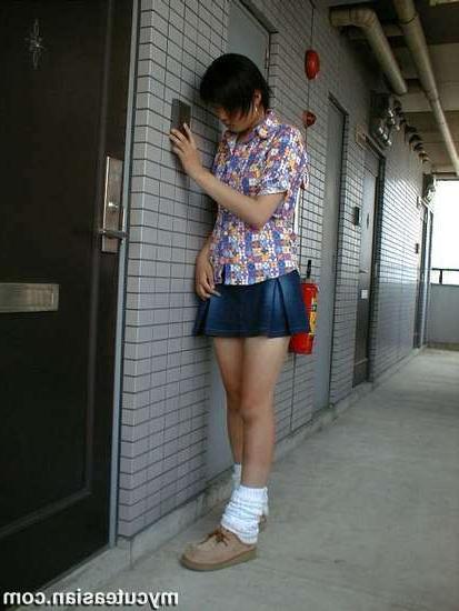 16P Shy Japanese coed shows her nice body outdoor