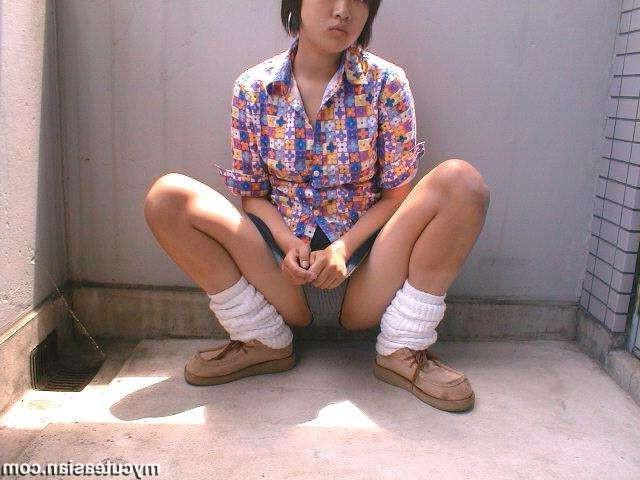 16P Shy Japanese coed shows her nice body outdoor
