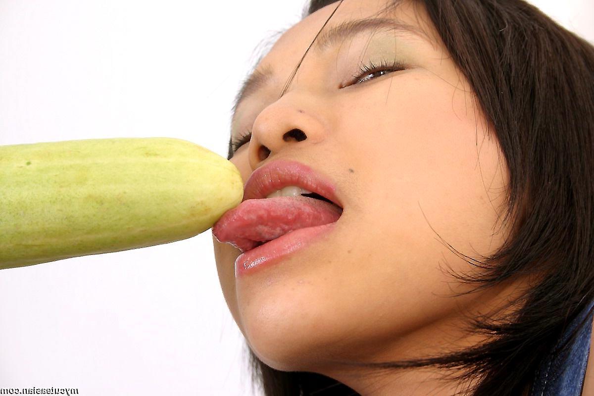 16P Busty Asian inserts fruits in her hairy pussy