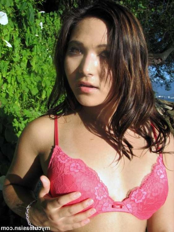 16P Busty Asian doing sexy posing in public beach