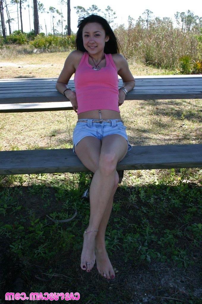20P Busty asian teen shows cleavage outside