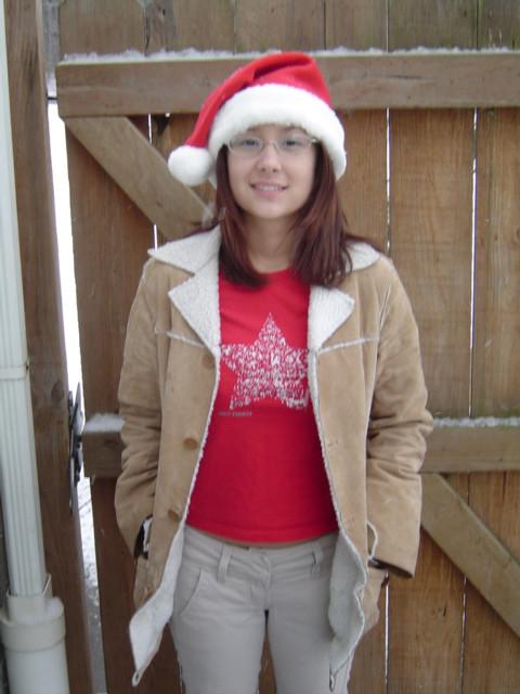 16P Asian teen wearing santa hat