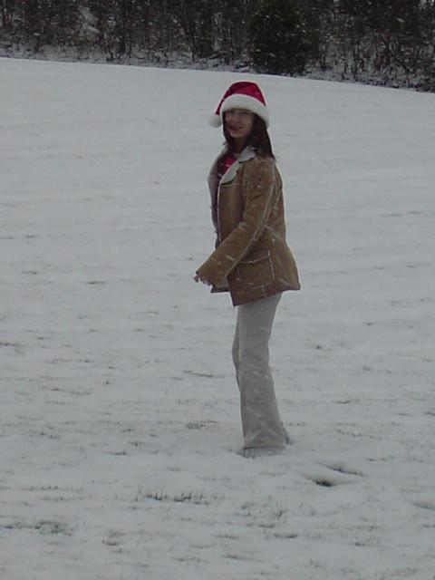 16P Asian teen wearing santa hat