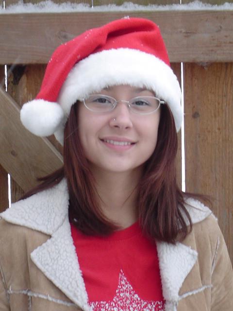 16P Asian teen wearing santa hat