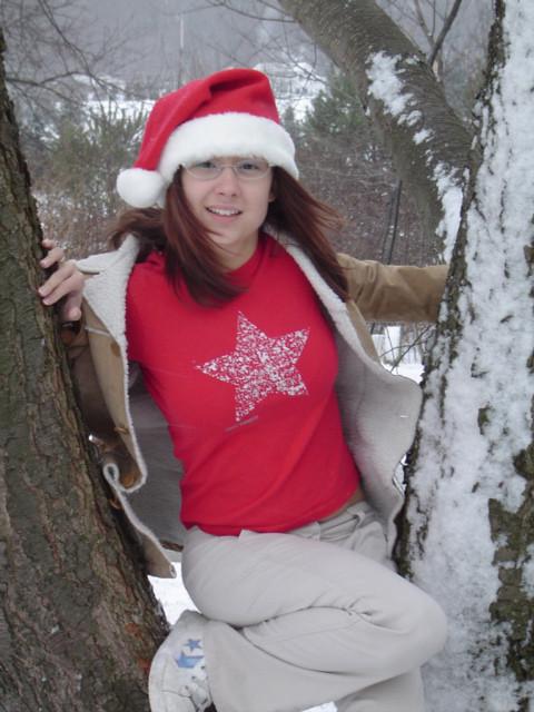 16P Asian teen wearing santa hat
