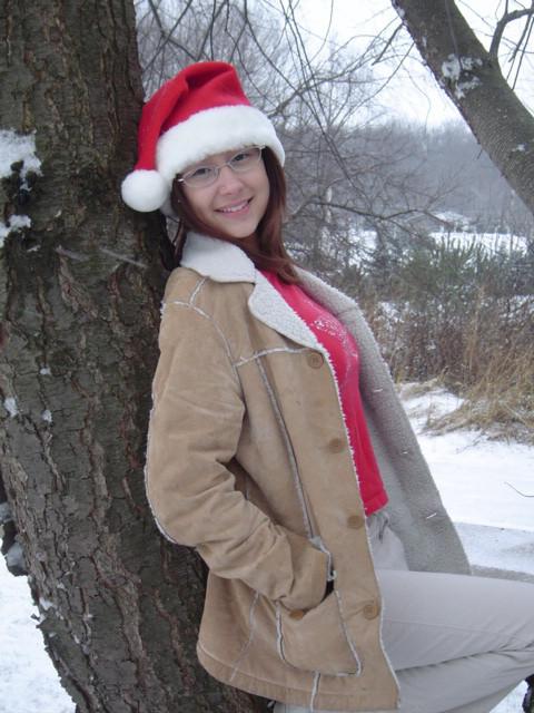 16P Asian teen wearing santa hat