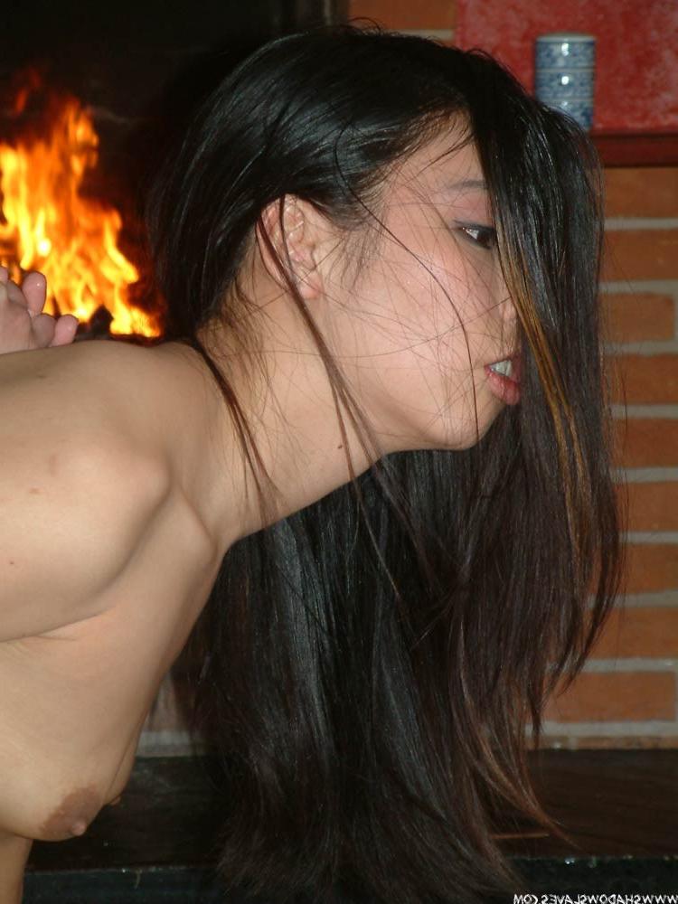 15P Cute oriental babe in bondage