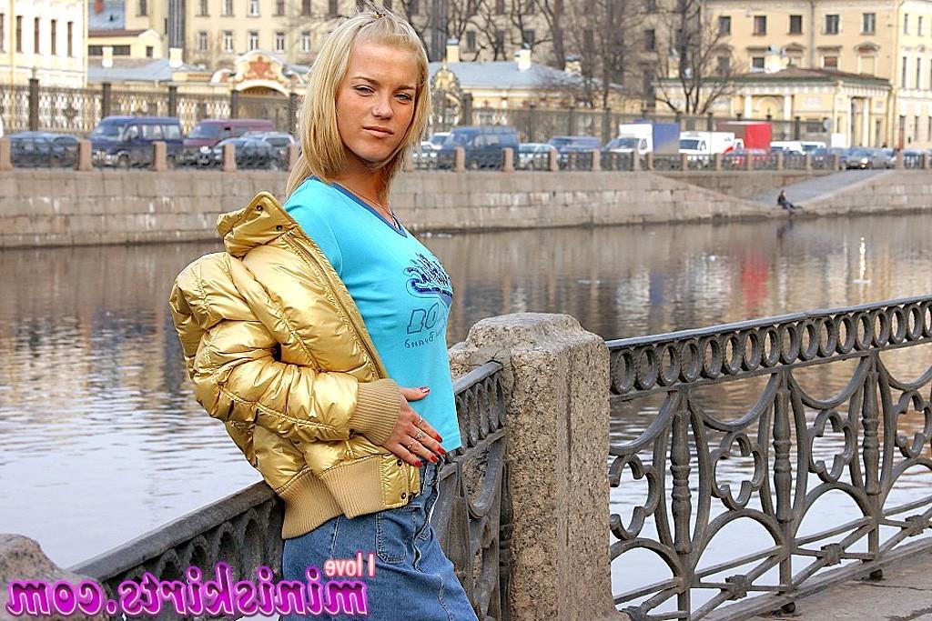11P Sexy blonde hottie in blue jean miniskirt posing outside by river