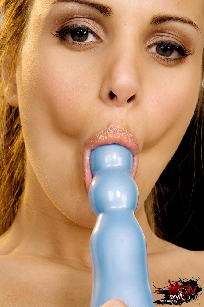 15P Andie Valentino plays with blue dildo