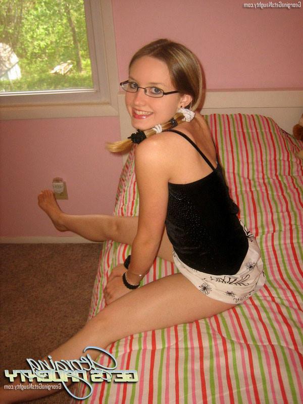 15P Georgina Naughty plays with dildo on bed