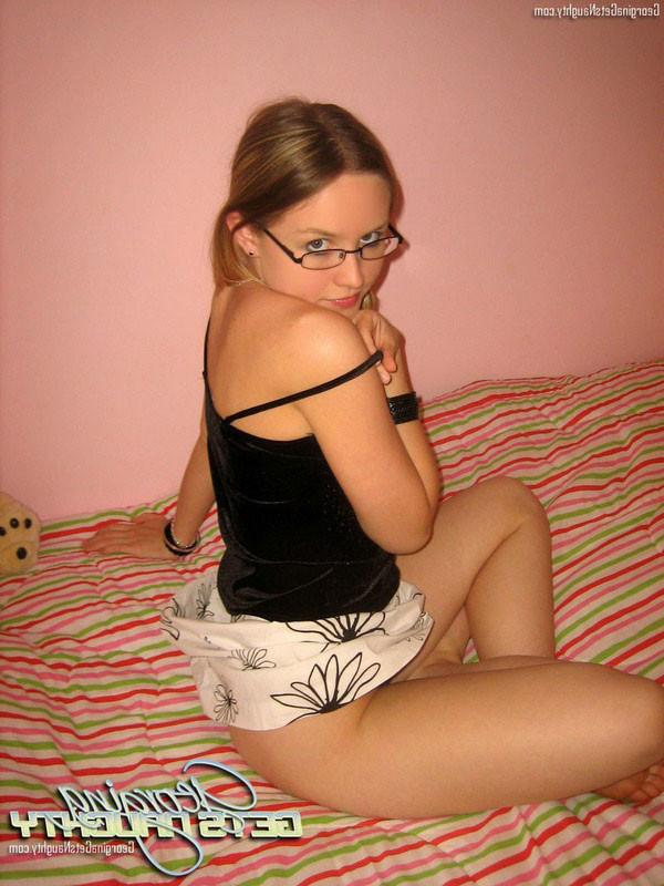 15P Georgina Naughty plays with dildo on bed