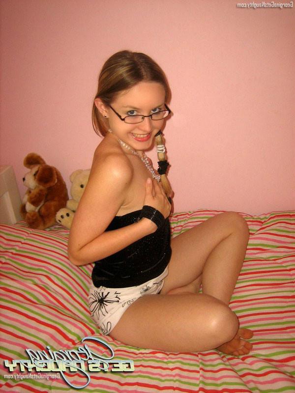 15P Georgina Naughty plays with dildo on bed