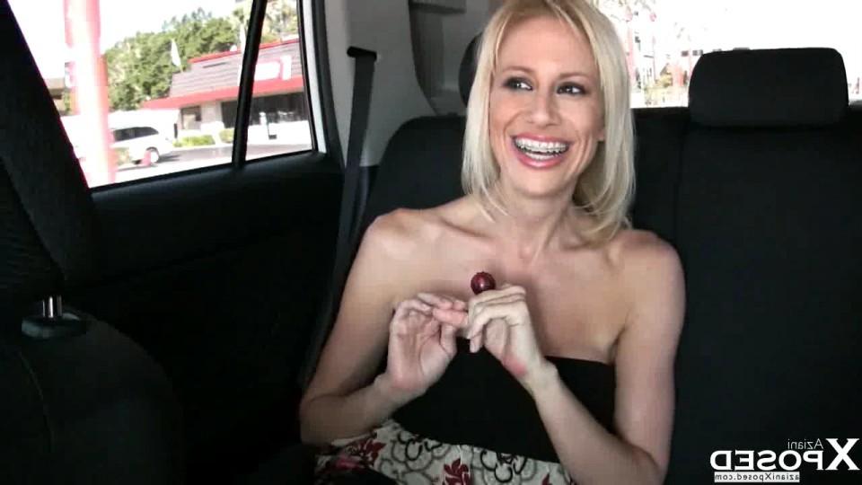 16P Big-boobed blonde babe, Kylie Worthy,has a blast flashing unsuspecting drivers o
