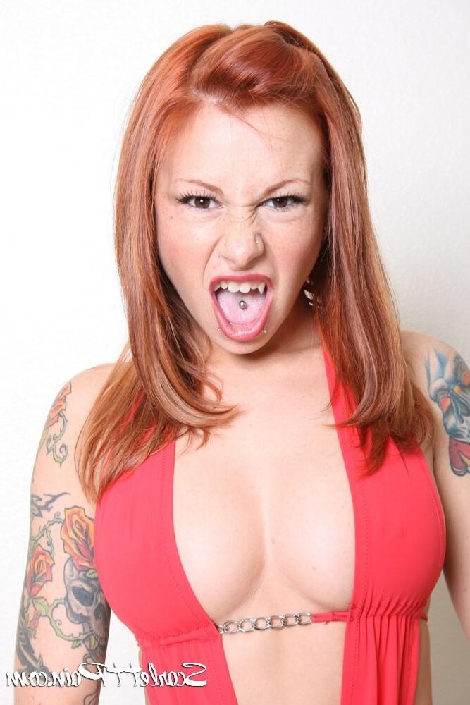 17P Scarlett Pain posing in her chair