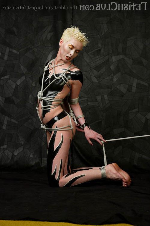11P Blonde In Body Suit Gets Bound By Rough Twine