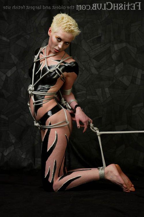 11P Blonde In Body Suit Gets Bound By Rough Twine