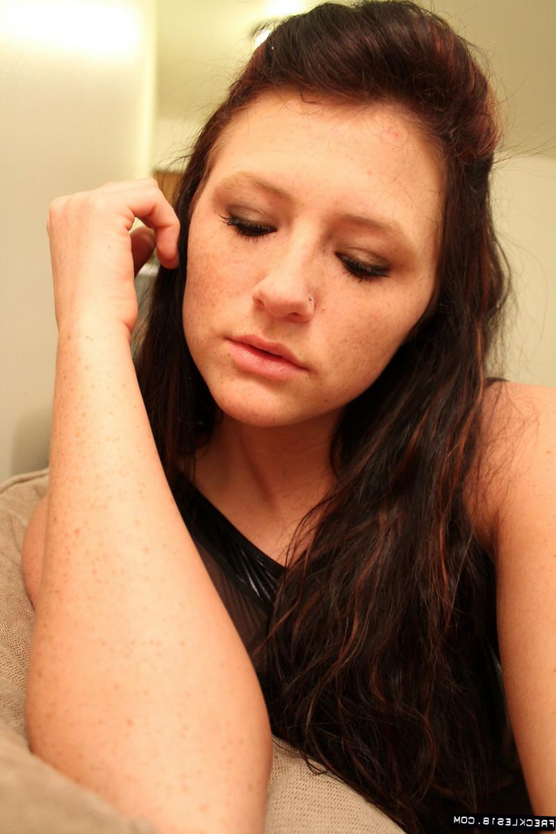 12P Stunning teenager stripping out of her hot black teddy