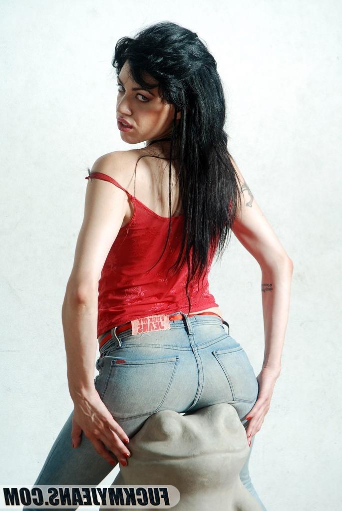 18P Black haired babe posing and teasing in tight denim blue jeans