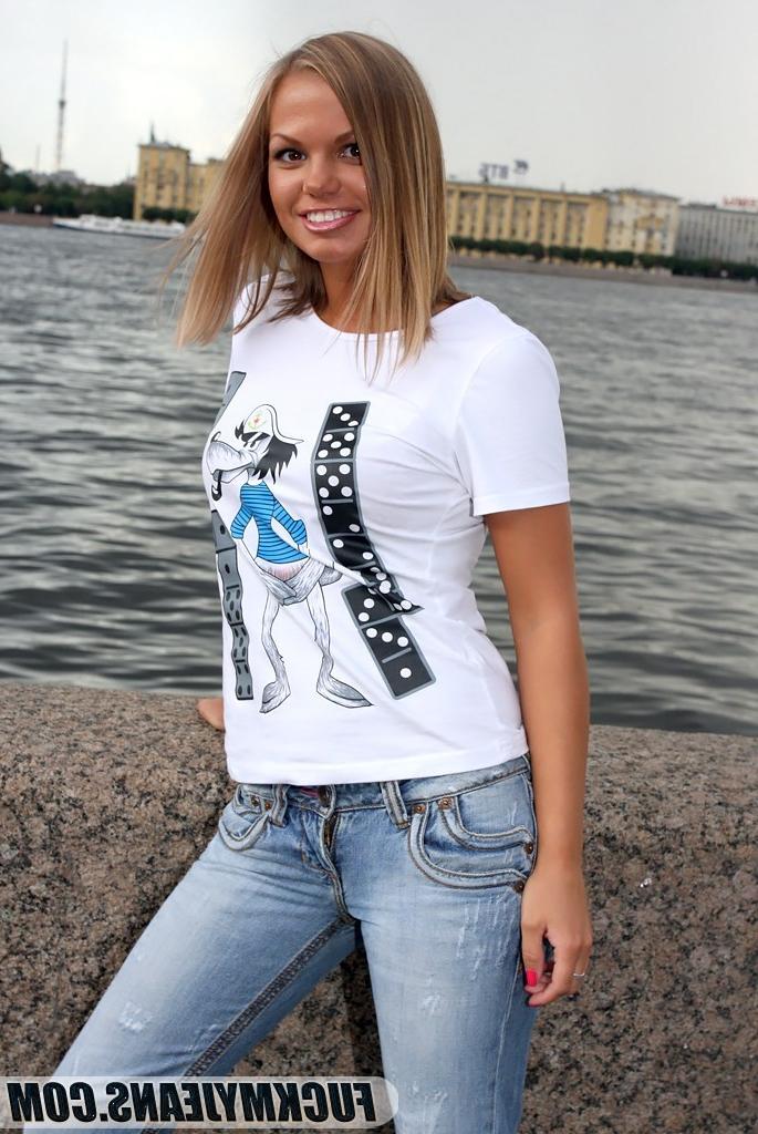 18P Cute blonde with tasty tits poses in tight blue jeans outdoors