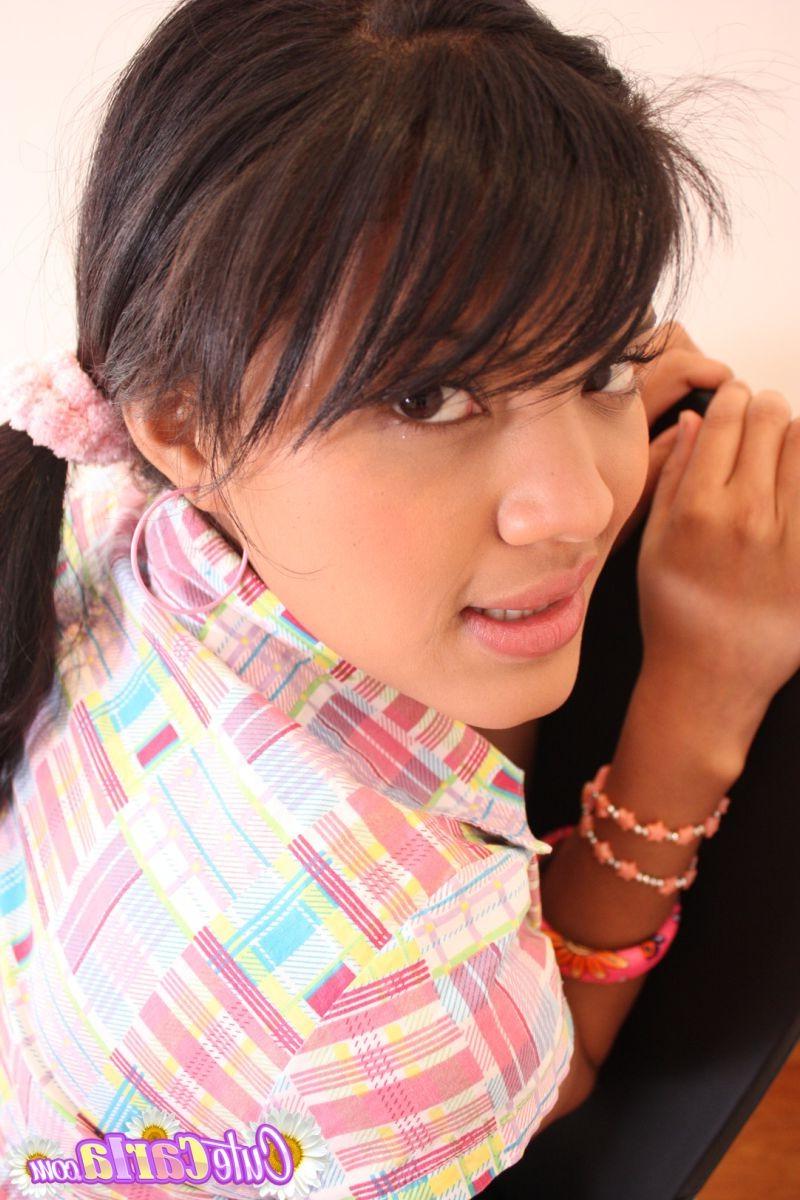 16P Latin teen with pigtails showing her small perky tits and pussy in tiny panties