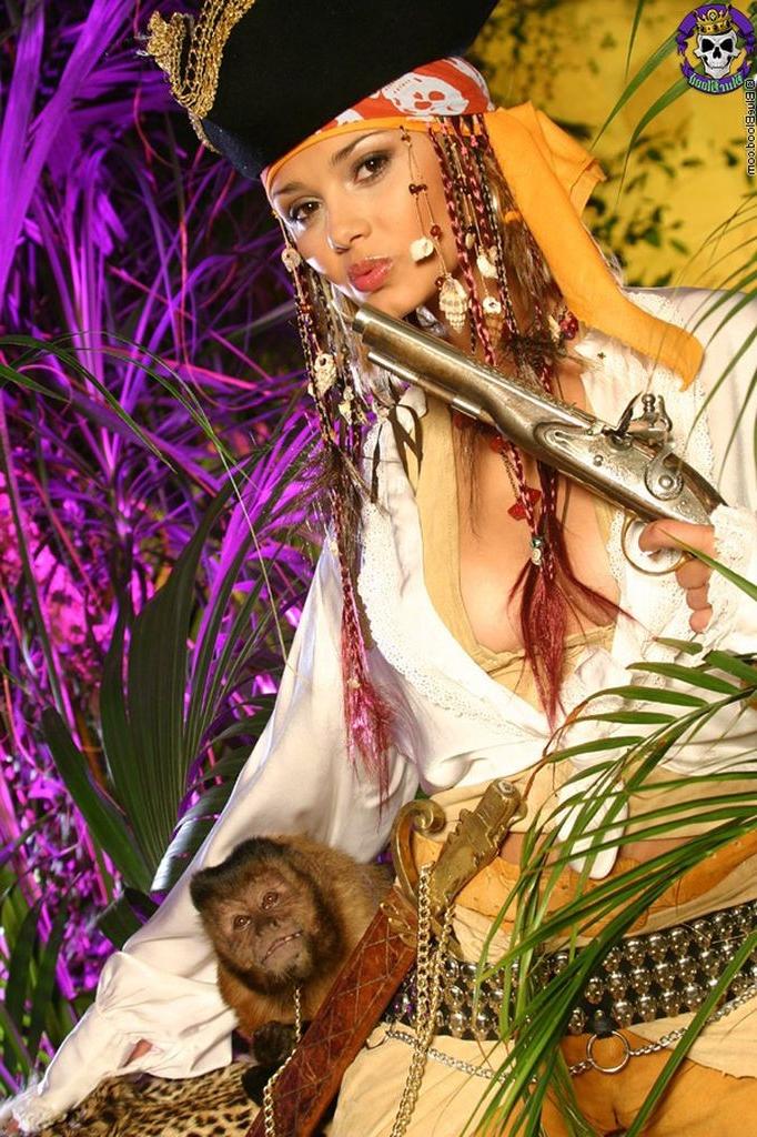 15P Naughty blonde pirate girl shows her big boobs