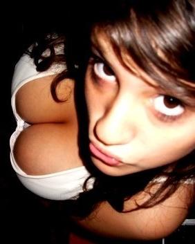 15P Gorgeous cute amateur busty teen posing on camera