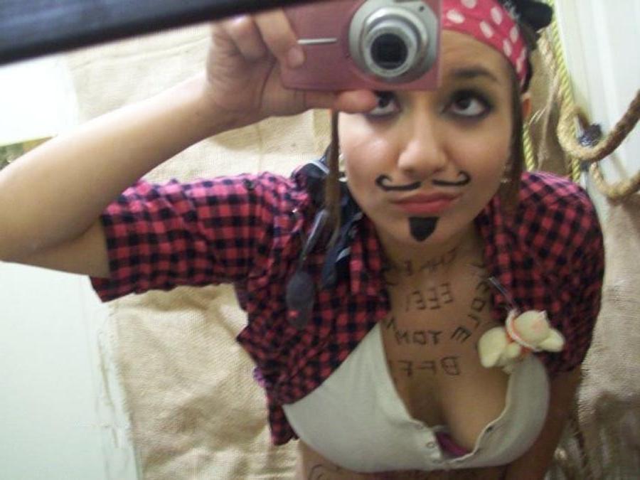 16P Cute brunette girlfriend self-shooting in pirate costume