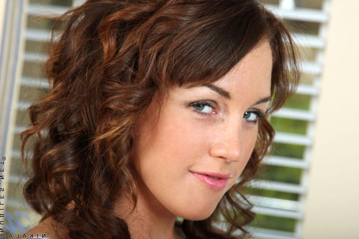 10P Busty teen babe removes her top during an interview with Nubiles.net