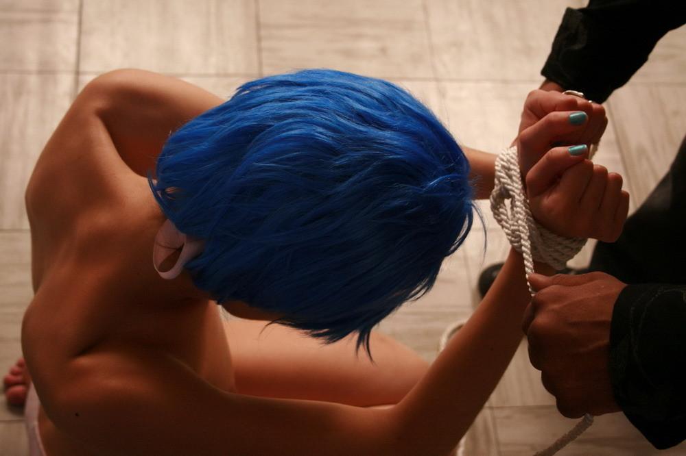 16P Slave forced to wash the floor while tied...does she slow down on purpose to des
