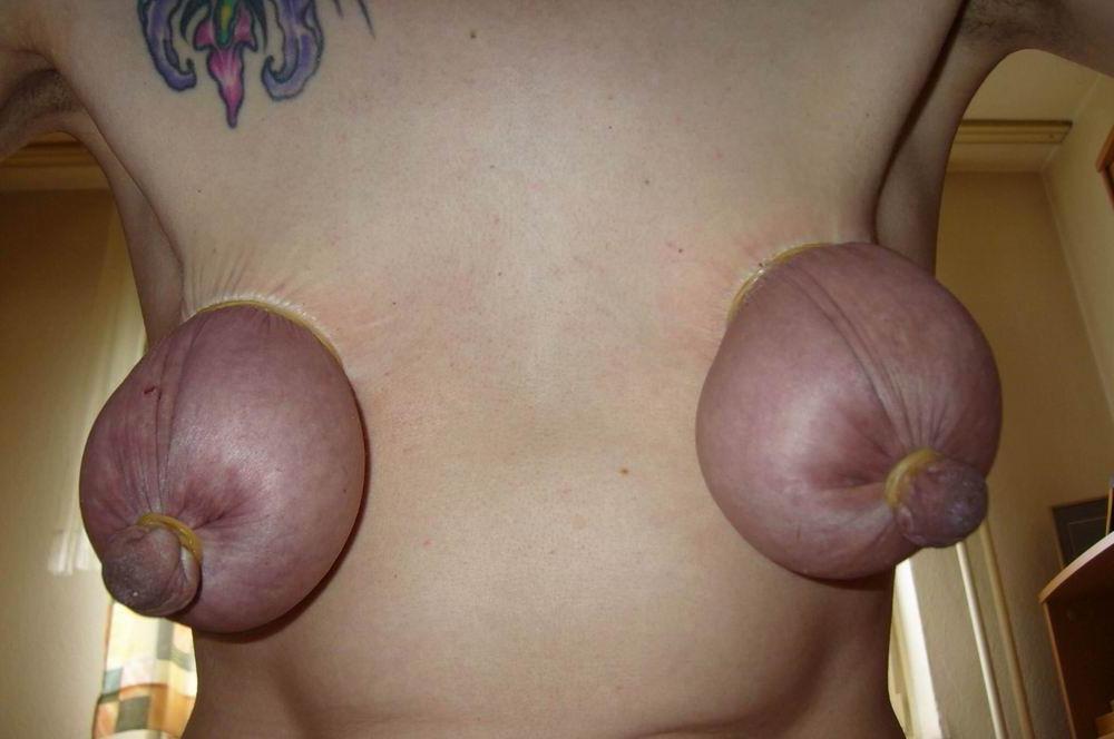 15P Huge erected nipples pierced and bondaged