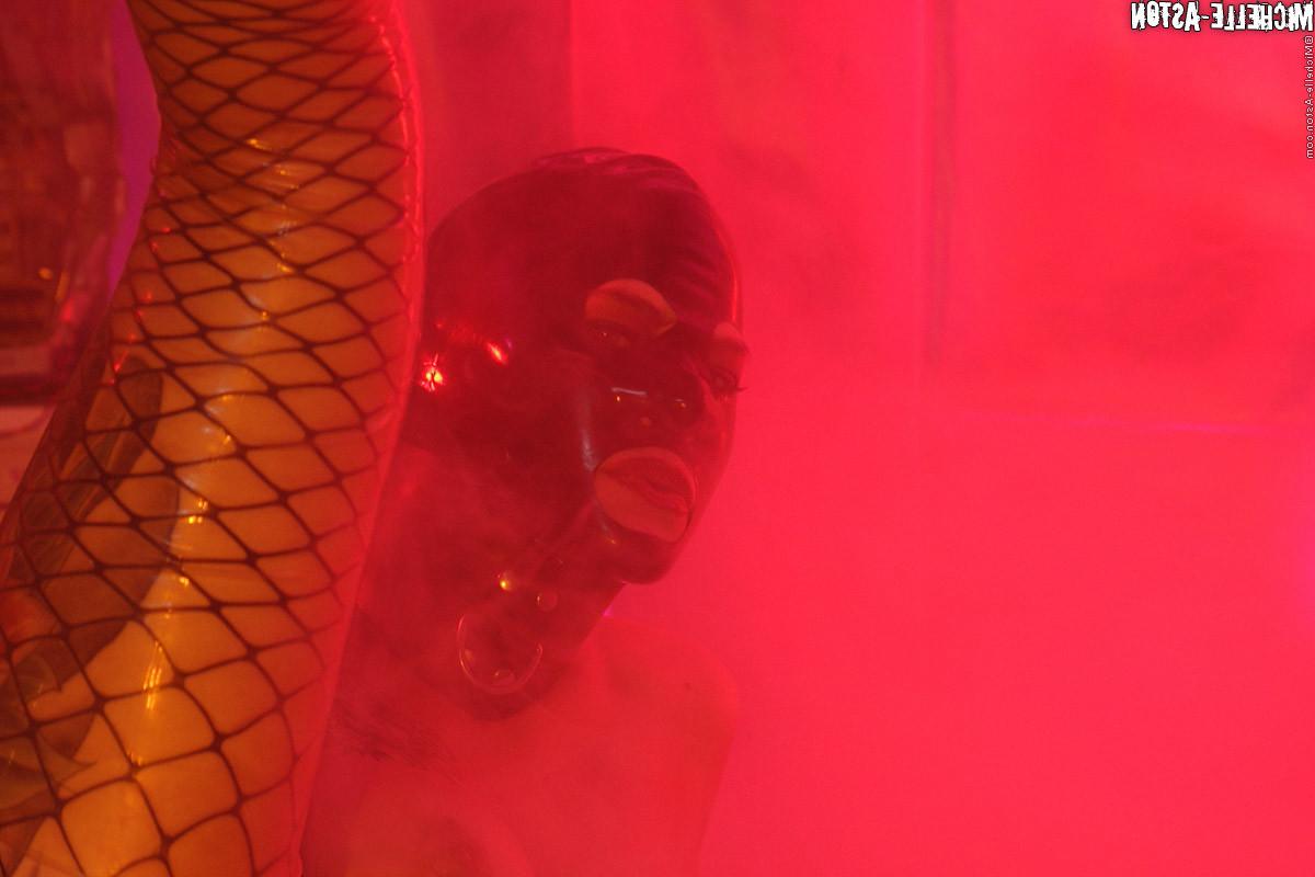 15P Hooded slut Michelle Aston in fishnets fucks self with dildo