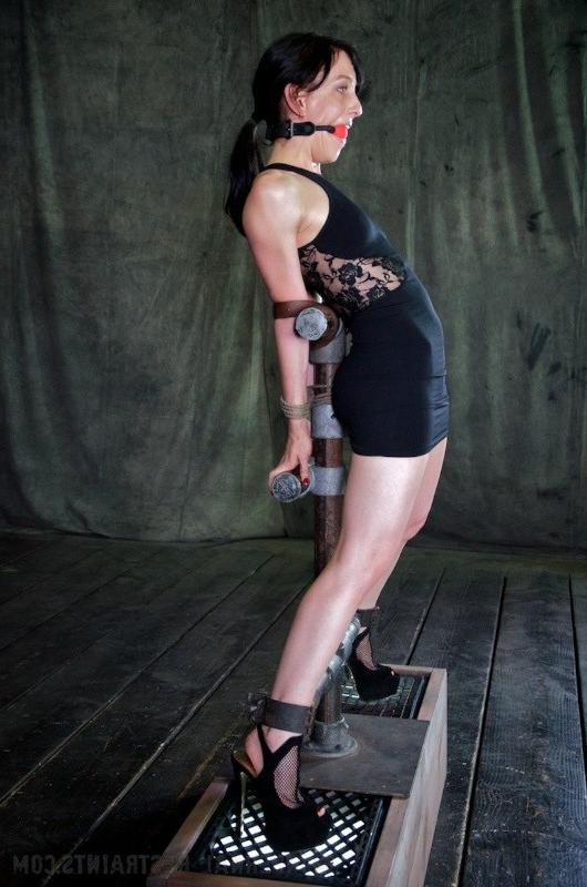 16P Elise Graves gets drilled in metal bondage wearing a red ballgag