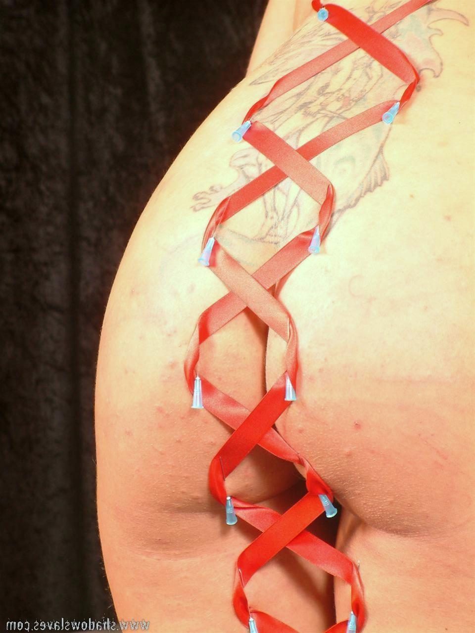 15P Sexy MILF slave in full body needle and ribbon corset