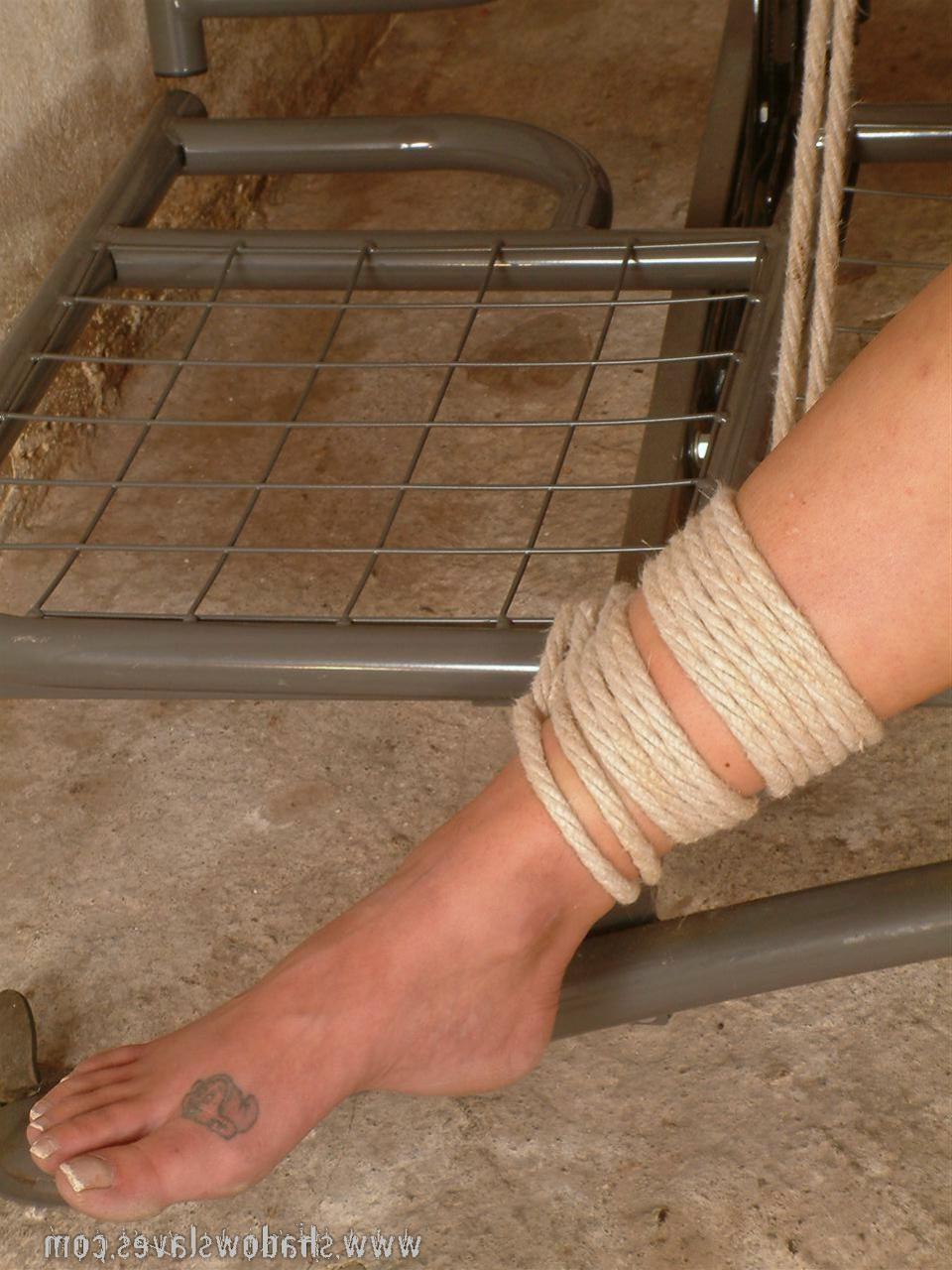 15P Naked MILF bound spread and helpless in a filthy barn