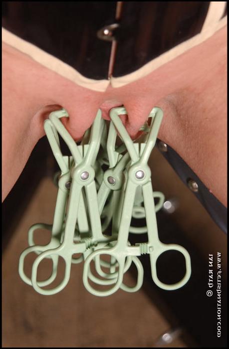 14P Blonde in latex corset is clamped and tormented