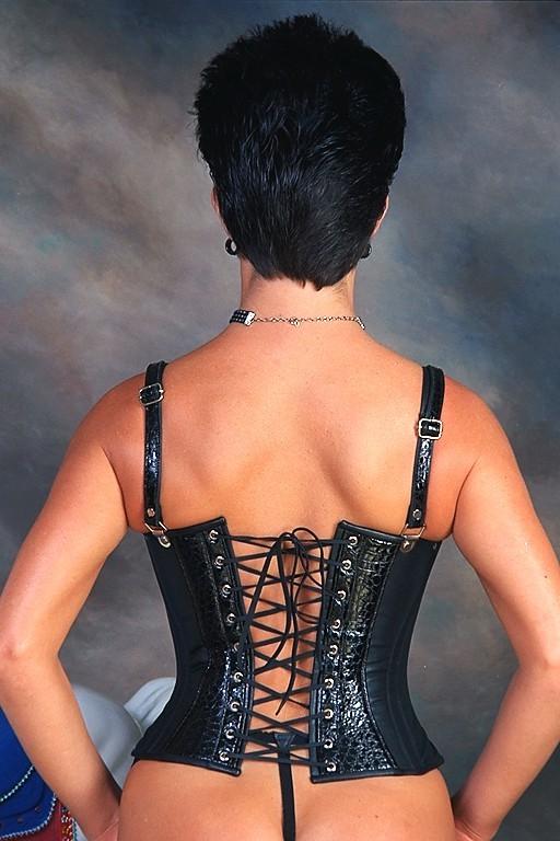 16P sexy brunette model in corsets posing