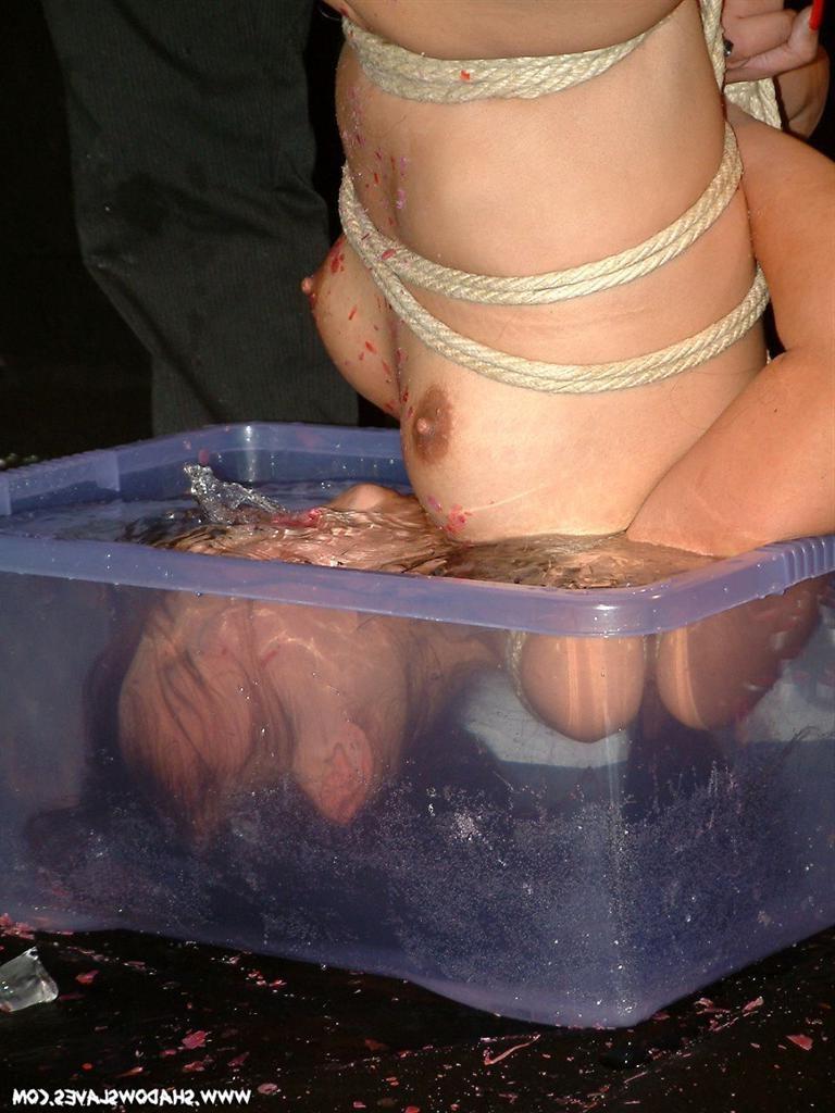 15P Oriental slavegirl dunked in iced water