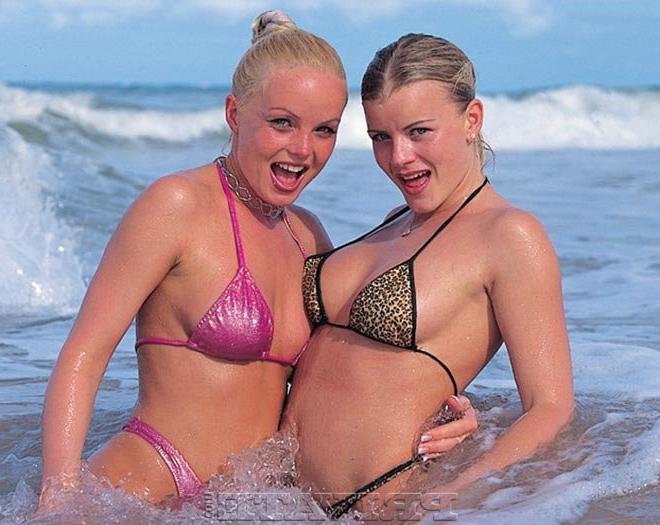 16P Sexiest blonde babe Silvia Saint shows her ass on the beach