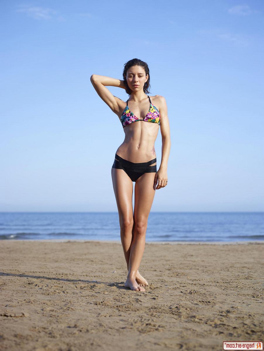 15P Nude model Rose from HegreArt posing on the beach