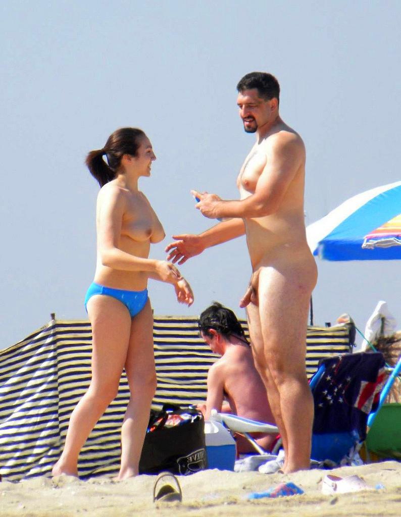 15P Everyone has clothes on except for this hot nudist