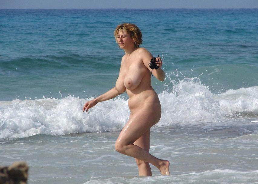 15P Naked milf with big boobs lets the water kiss her body