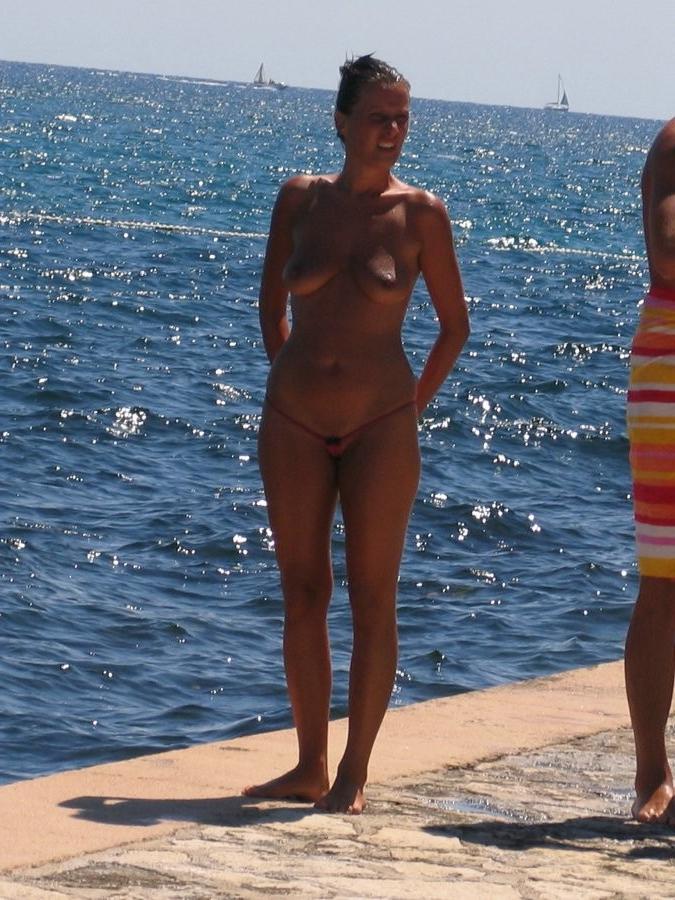 15P Amazing nude brunette shows off her sexy naked body
