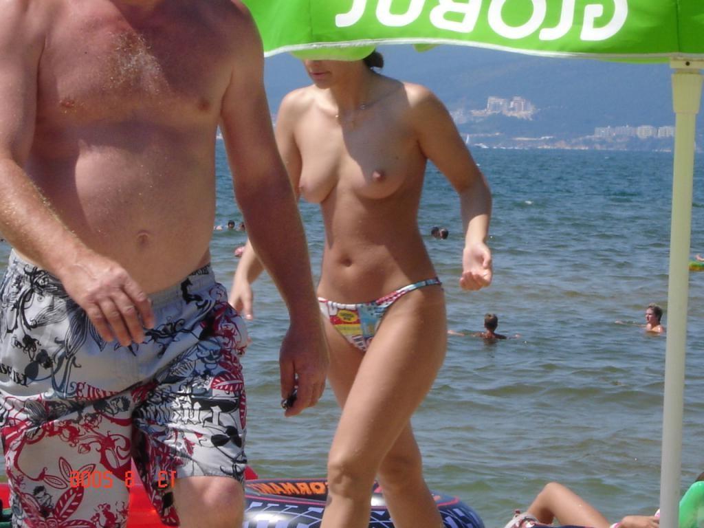15P Raven haired goddess nudist shows off her body