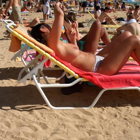 15P Blonde has some fun being nude on a public beach