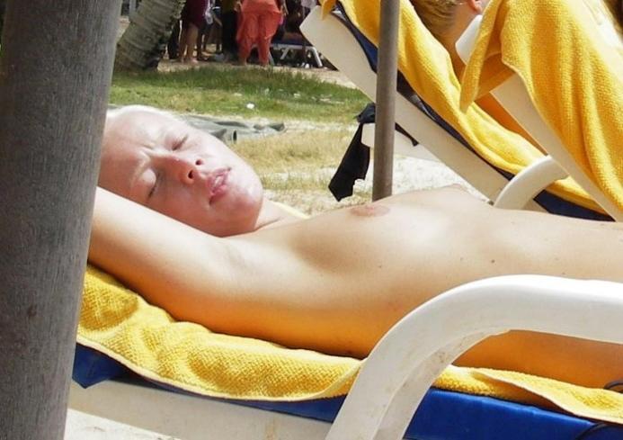 15P Blonde has some fun being nude on a public beach