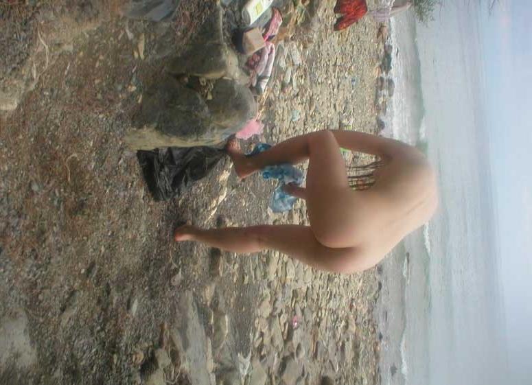 15P Blonde has some fun being nude on a public beach