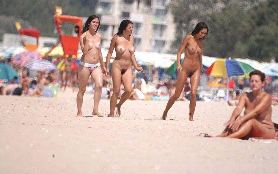 15P Blonde has some fun being nude on a public beach