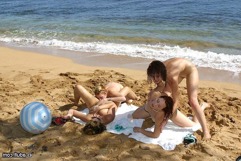 16P Nudist lesbian babes playing beach games and having a foursome