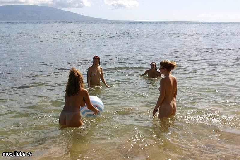16P Beautiful nudist lesbians having a foursome on a sunny beach