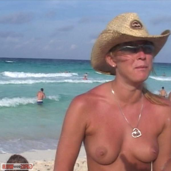 10P Drunk cowgirl on the beach takes off her top